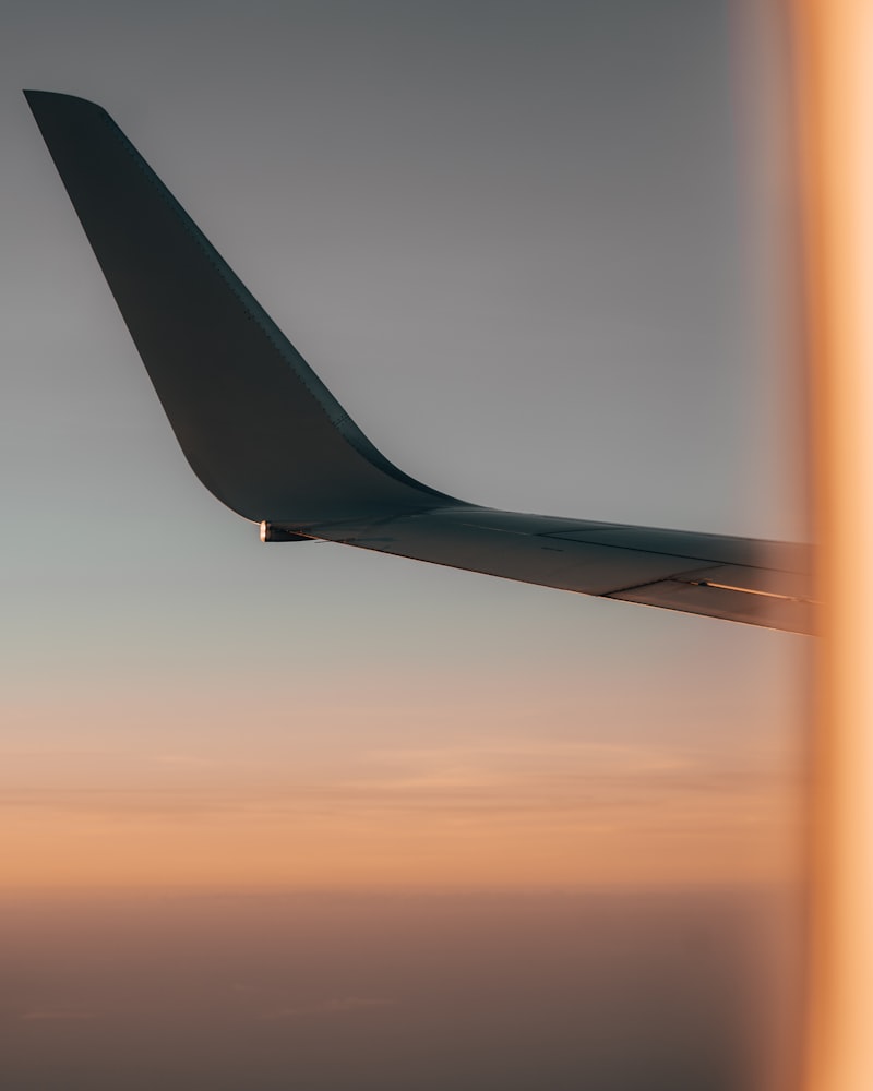 Scenic view from airplane window above clouds